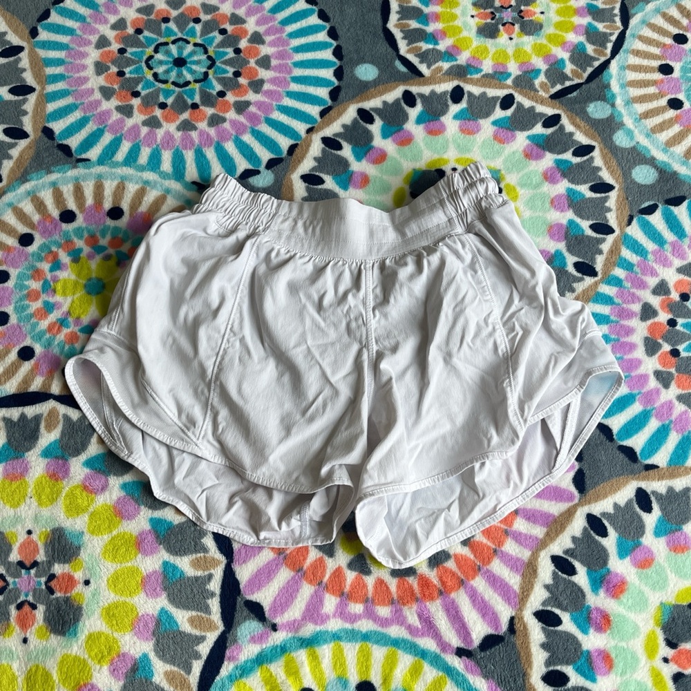 white lululemon shorts low rise 4 inch size 4